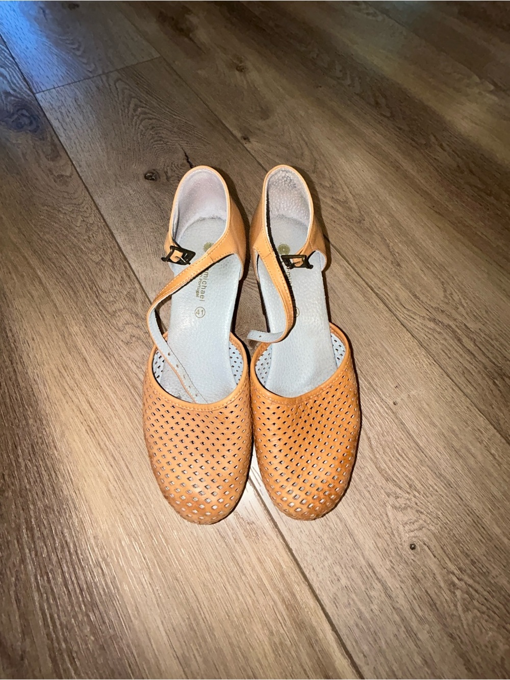 Eric Michael Women’s leather Perforated Ankle-Strap clogs